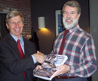 NH Governor John Lynch receives a copy of Manchester's Airport: Flying Through Time from co-author Ed Brouder